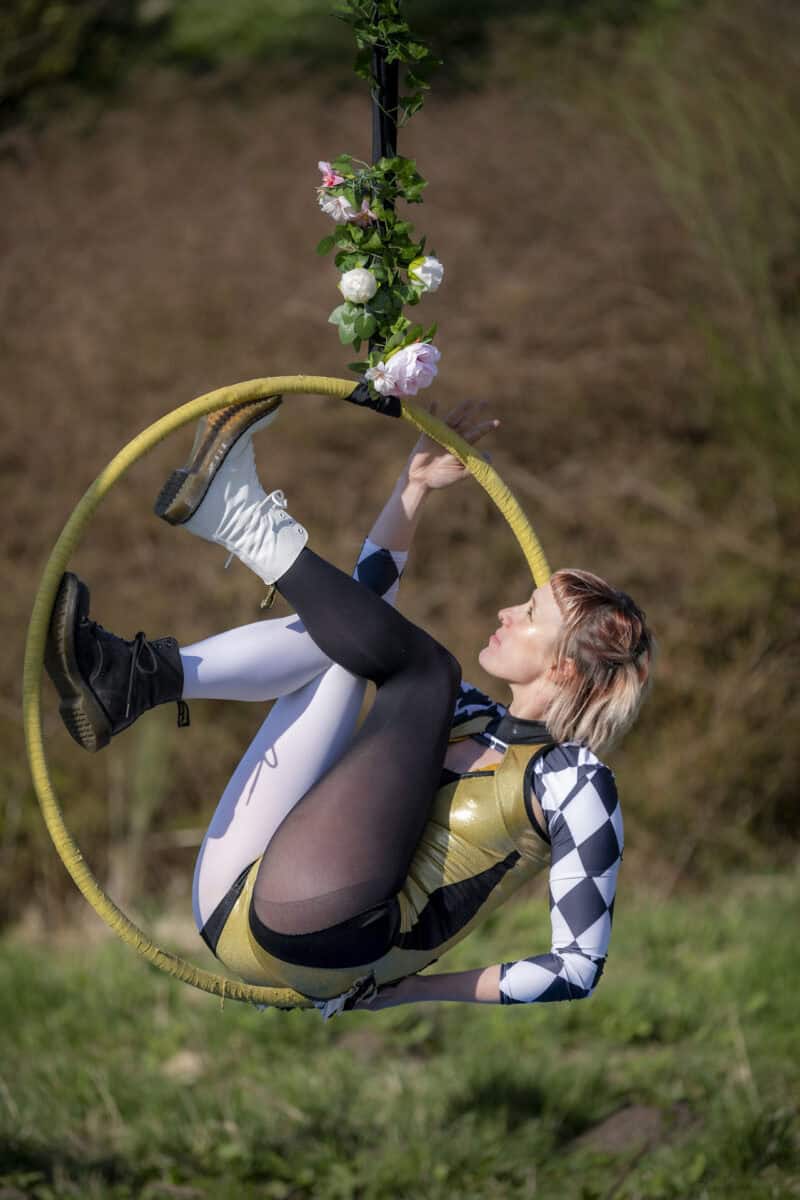 Rachael on aerial hoop with flowers