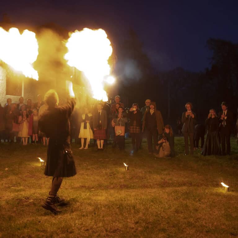 Ruaraidh with fire staff