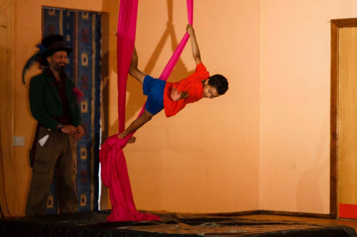 Young boy on silks